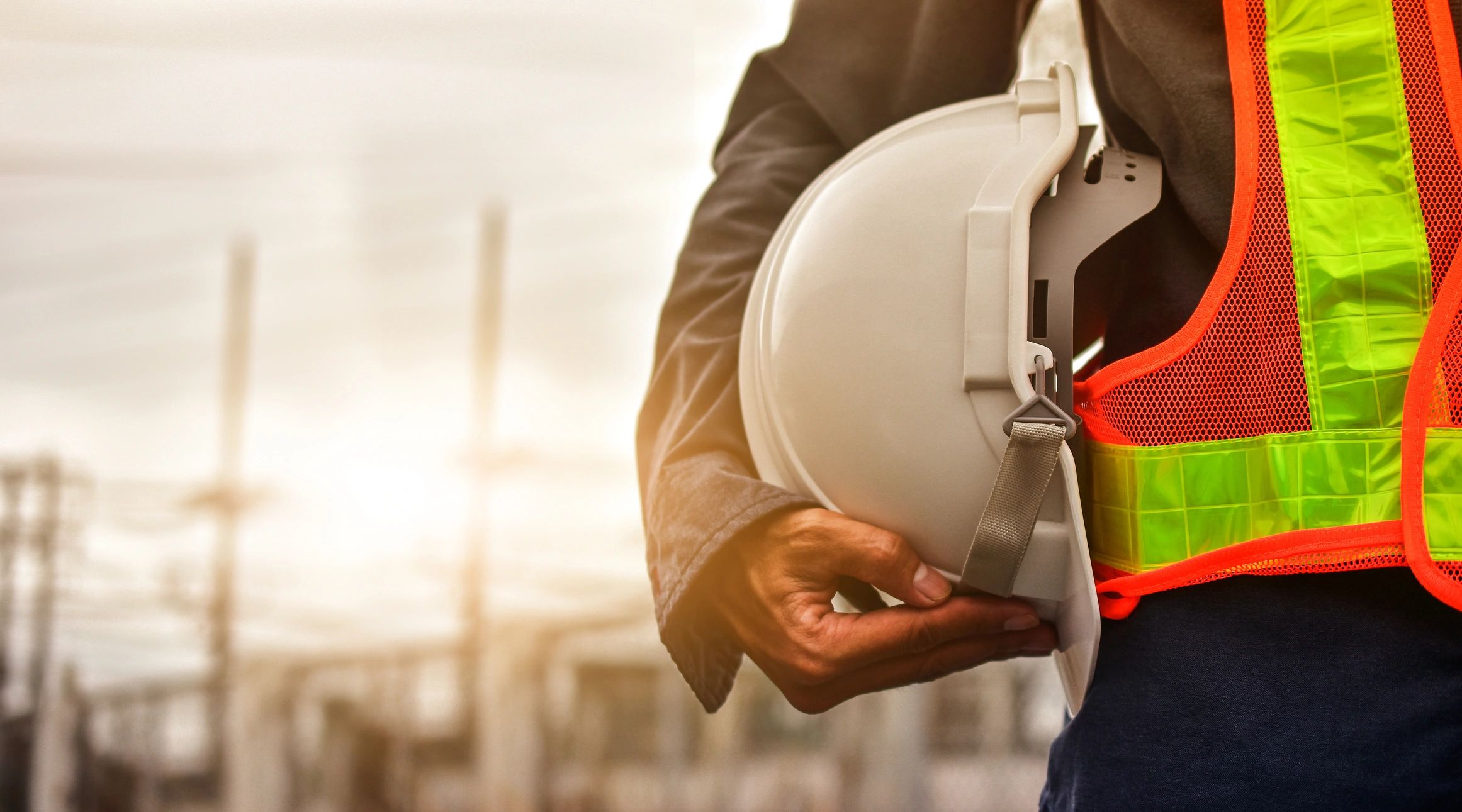 Engineer reviewing lockout tagout signage in an industrial plant